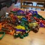 a pile of cookie cutters on a table