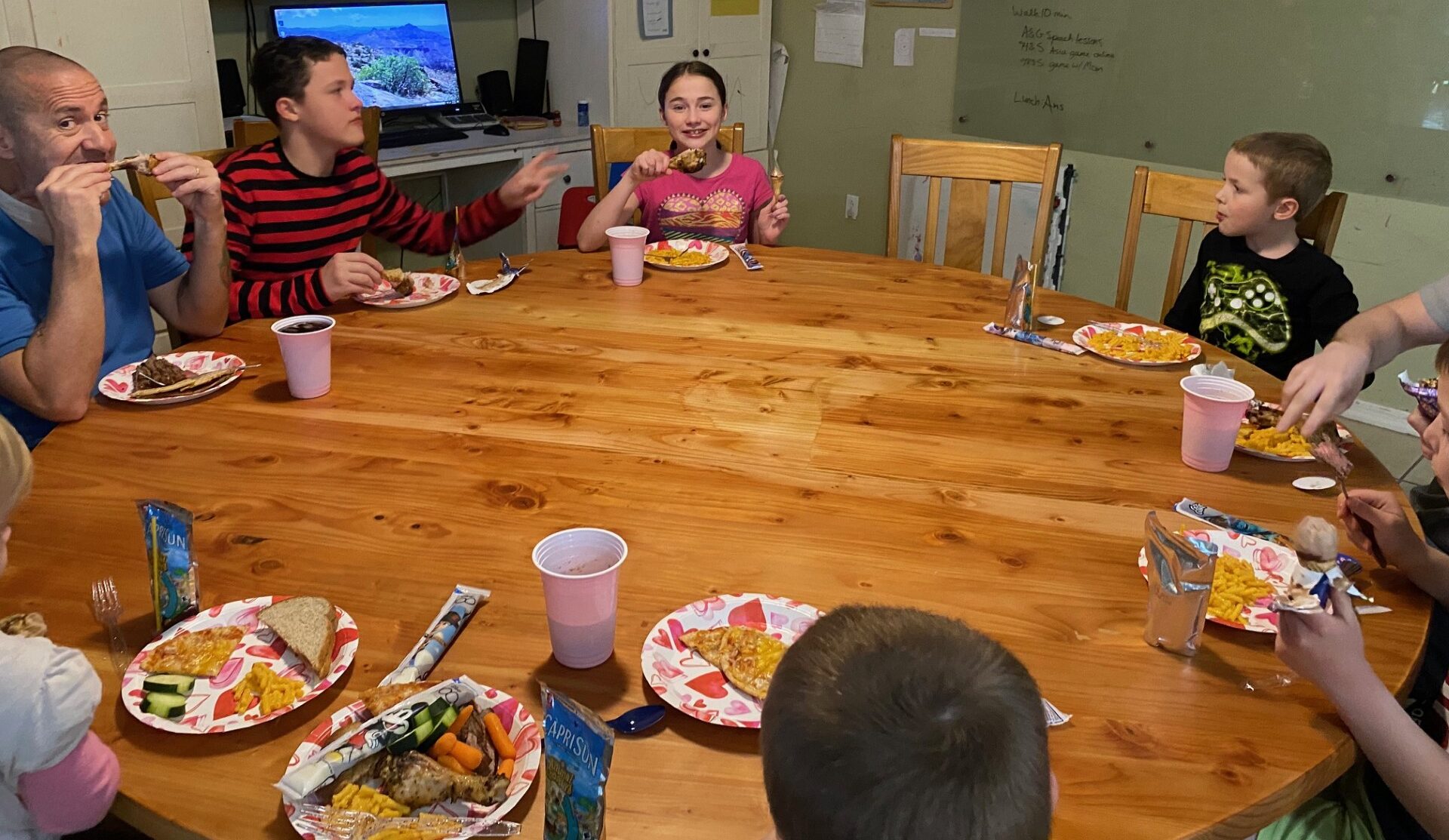 a big family eating at a round table