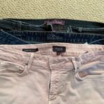 three pairs of pants in 3 sizes, focused on the waist