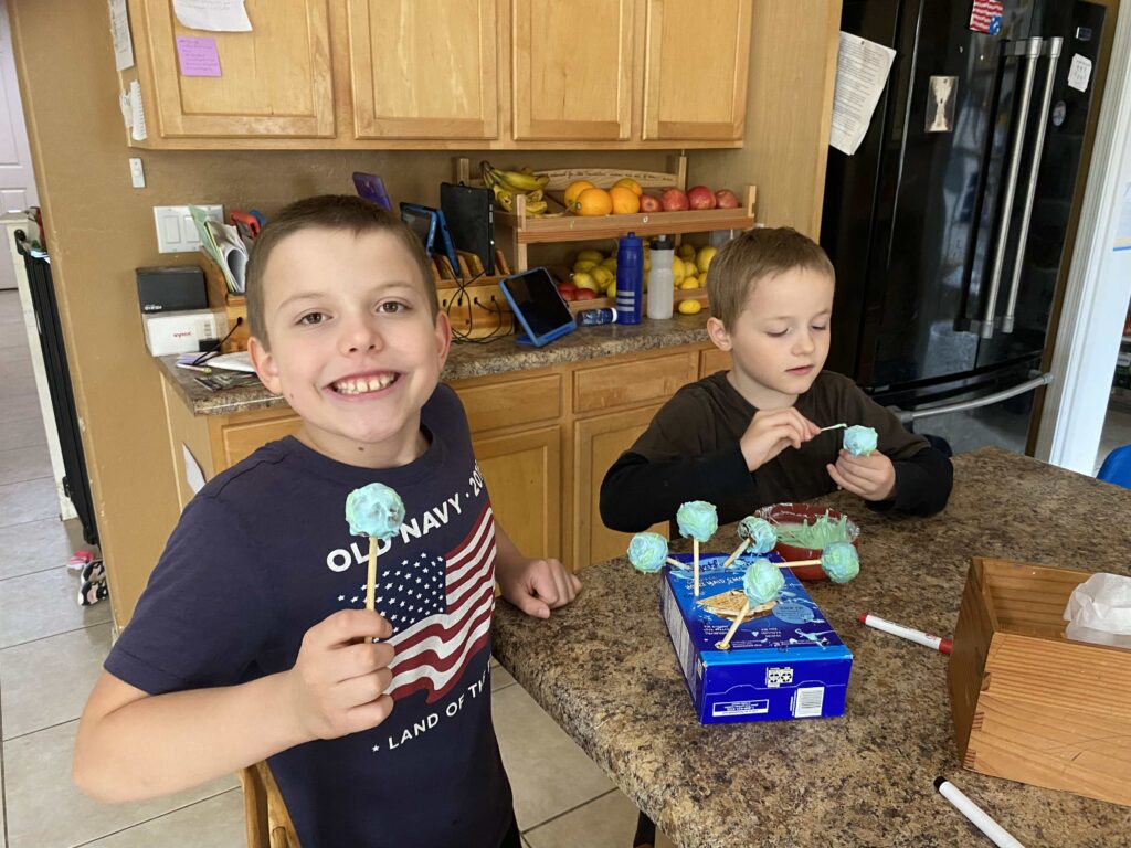 boys making green cake pops