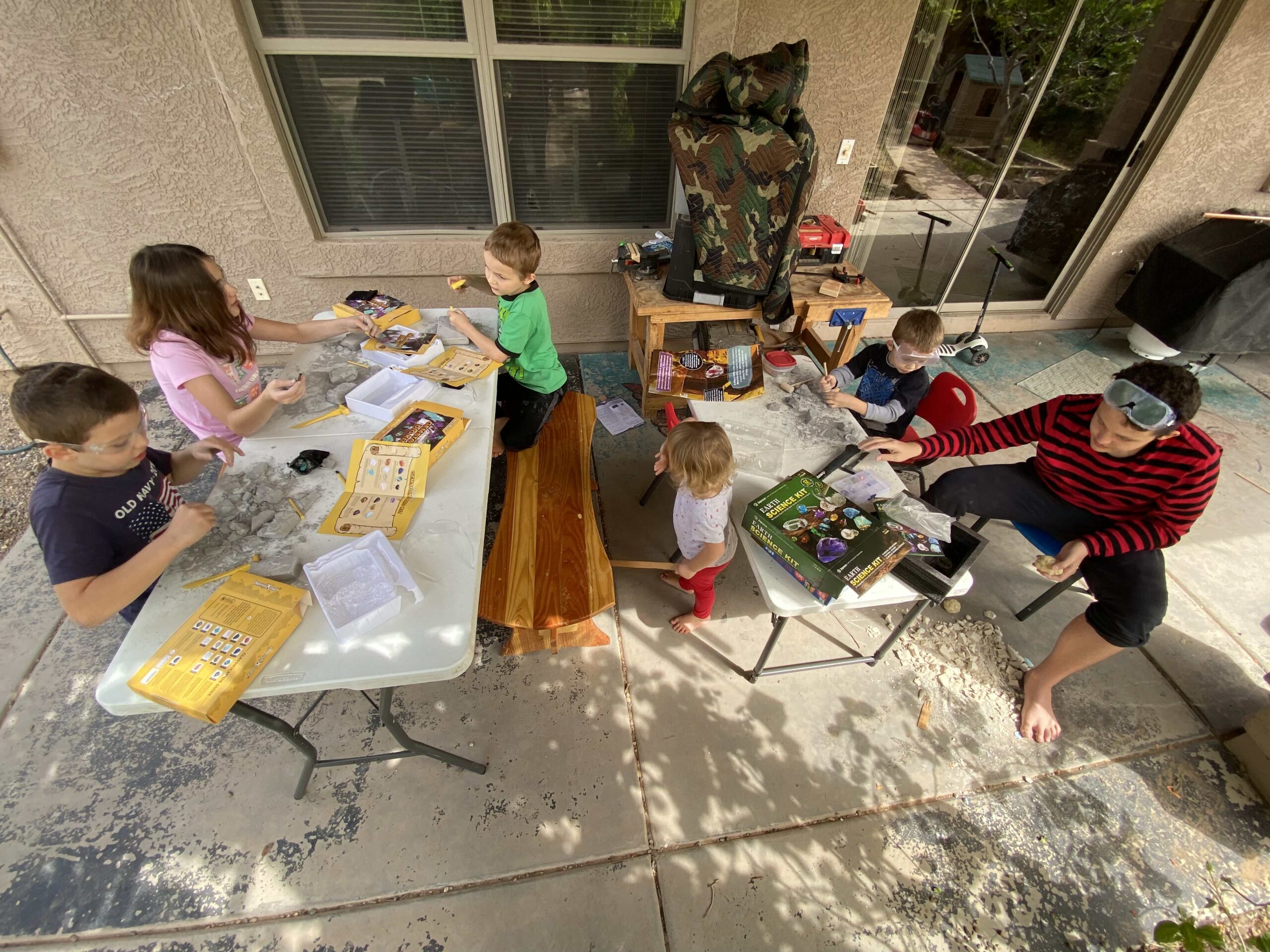 kids at tables doing a project